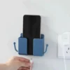 حامل الموبايل والريموت: حامل الموبايل اللاصق على الحائط أثناء شحن الموبايل من Y-Needs